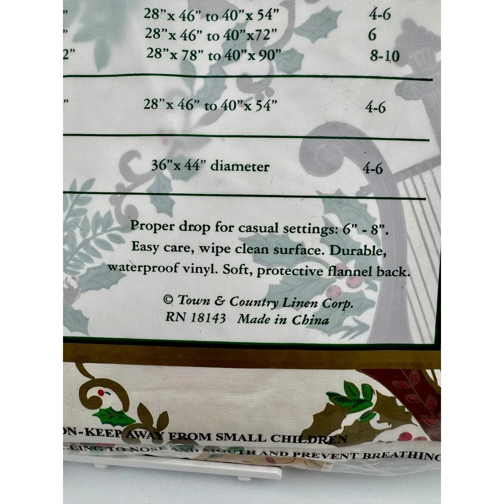 VTG Town & Country Christmas Vinyl Tablecloth 52x90 Oblong Horn Holly Bow NOS